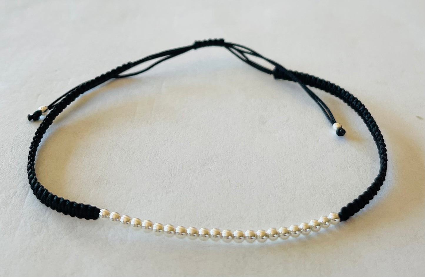 Sterling Silver Ball Beads on Braided Black Cording Bracelet Media 5 of 12