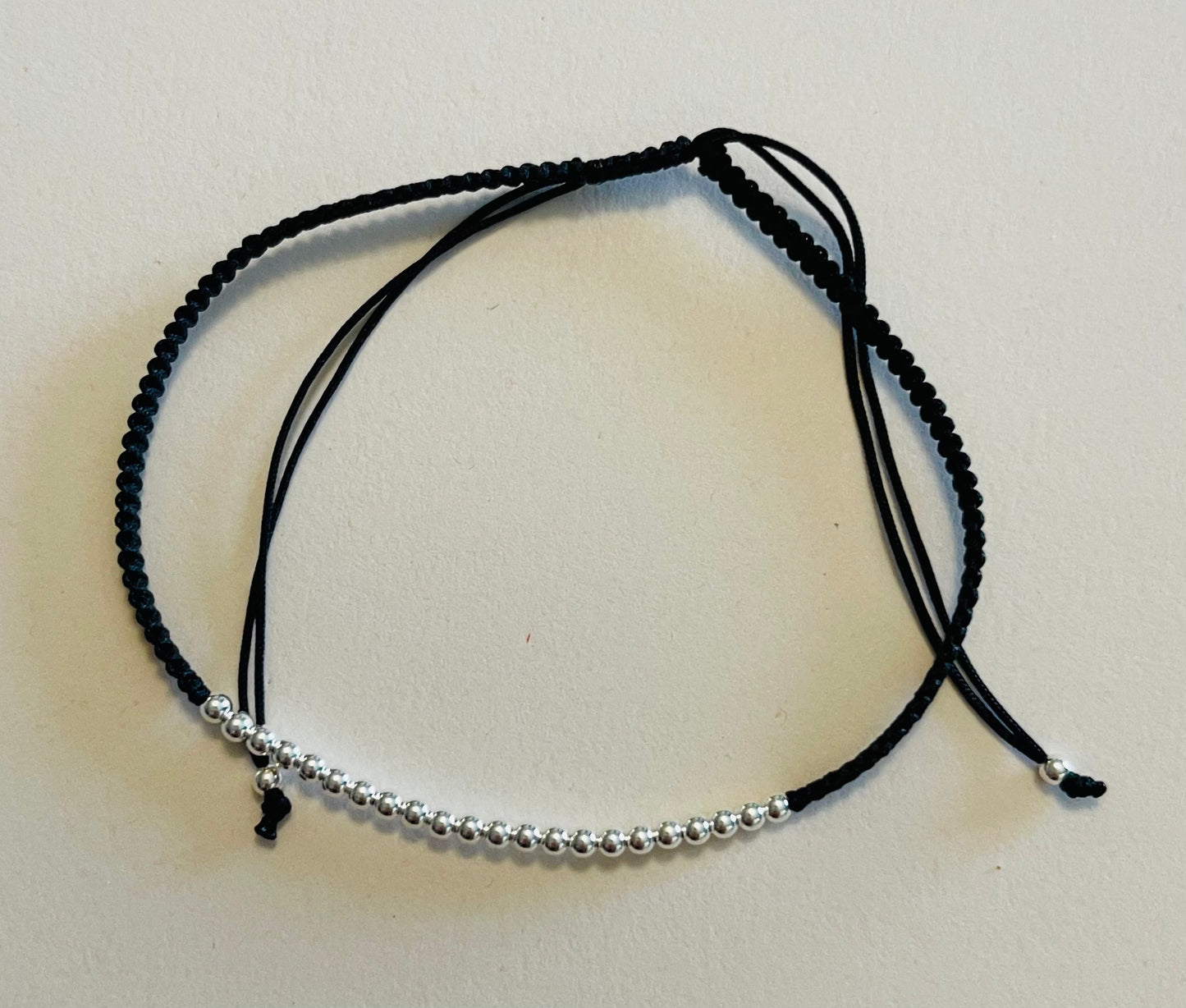 Sterling Silver Ball Beads on Braided Black Cording Bracelet Media 12 of 12