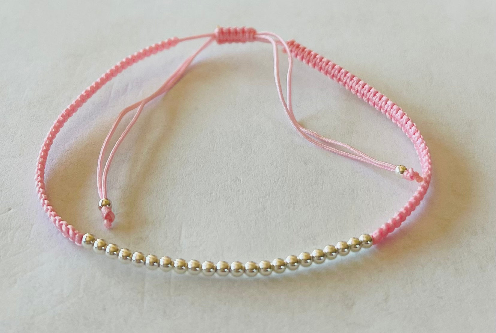 Sterling Silver Ball Beads on BraidedPink Cording Bracelet Media 7 of 12